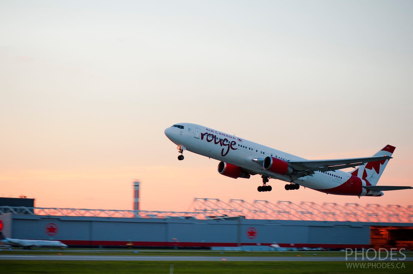 Air Canada Rouge plane landing - Airport Montreal Trudeau