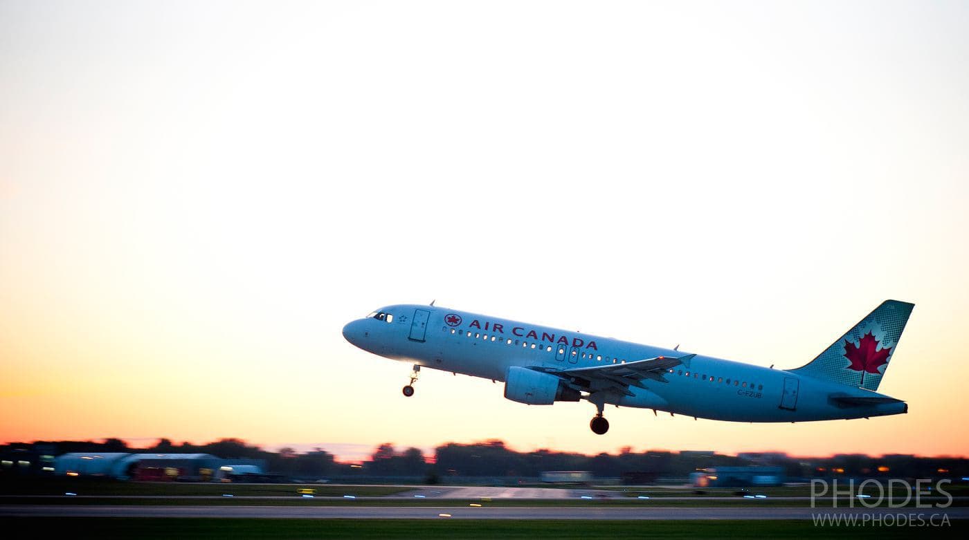 Air Canada plane taking off on sunset - Airport Montreal Trudeau