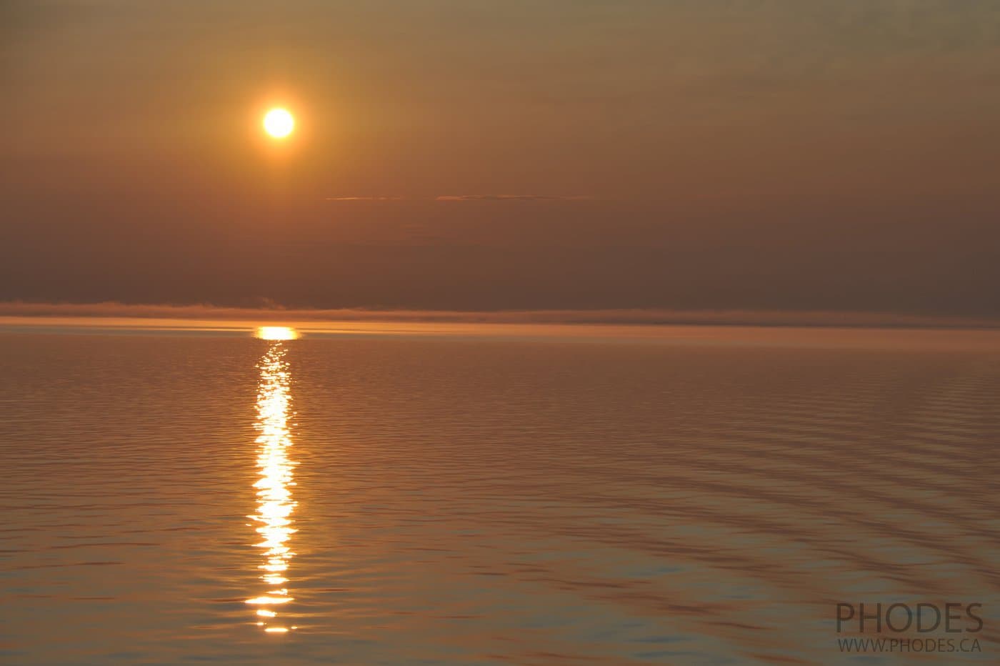 Le coucher du soleil sur le traversier